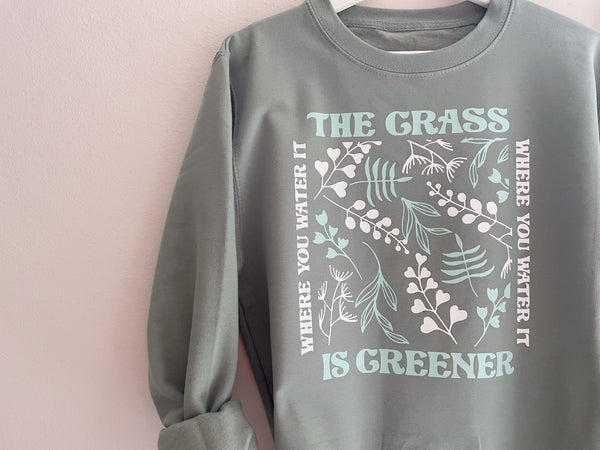 The Grass Is Greener Where You Water It - Unisex Fit Sweater