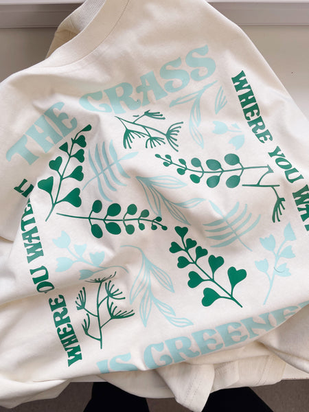 The Grass Is Greener Where You Water It - Unisex Fit T-Shirt
