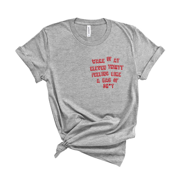 Wake Up At Eleven Thirty Feeling Like a Bag of Sh*t - Unisex Fit T-Shirt